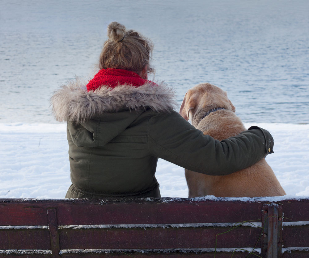 girl-whispering-to-dog